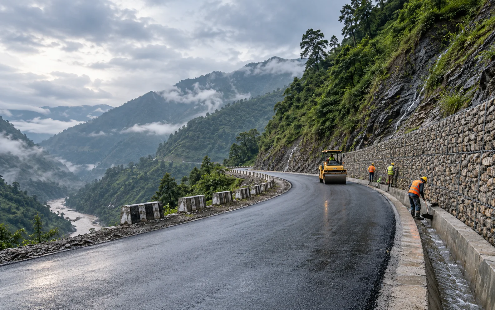 Road works with retaining walls and drainage in Nepal's mountain terrain